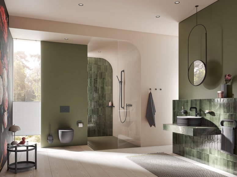 Bathroom with green and grey accents in the WC and shower areas, as well as around the washbasin