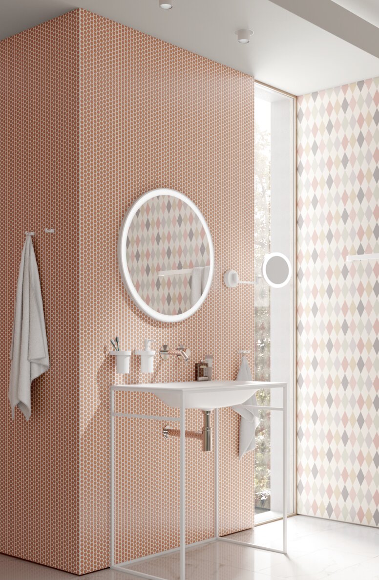 HEWI System 800 Interior Accessibility washbasin with a robust frame that allows wheelchair access, featuring an orange-red tiled wall in the wash area