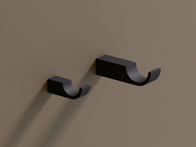 HEWI System 800 Hook Two black powder-coated hooks of different lengths mounted side by side on a brown wall