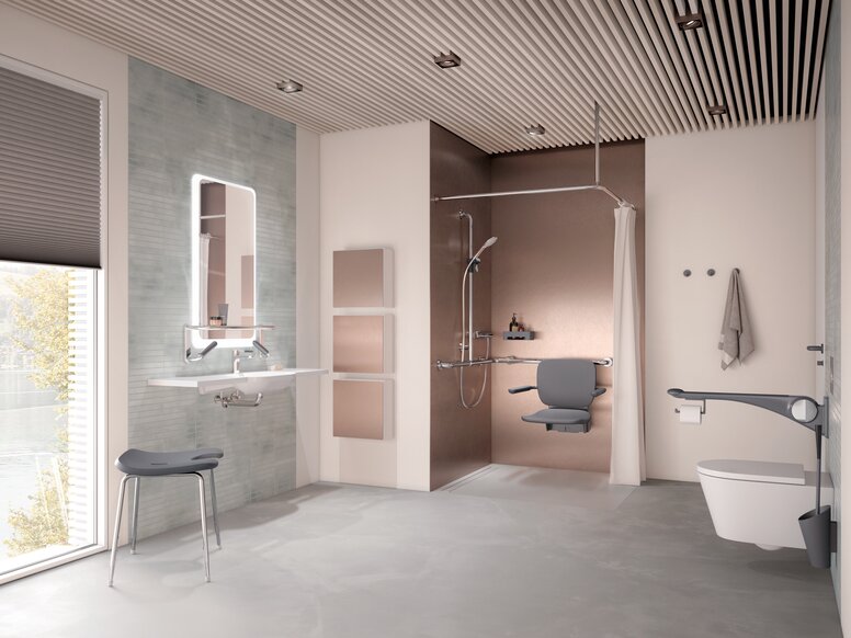 HEWI Range 802 LifeSystem Interior A shower seat with a backrest in the shower area, as well as a WC in the bathroom fitted with a hinged support rail and a washbasin with a stool