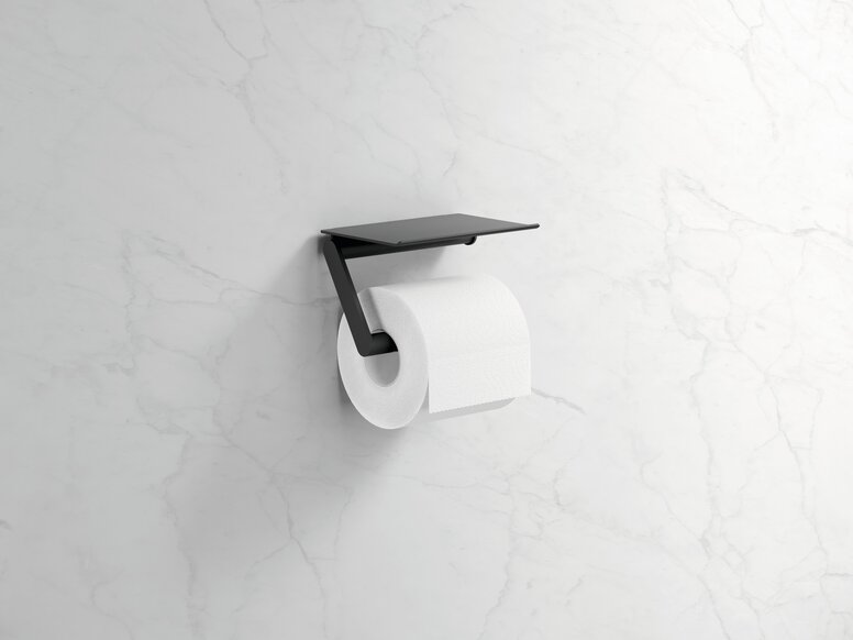 HEWI System 900 toilet roll holder with shelf Black powder-coated toilet roll holder with an open shelf on a white marble wall