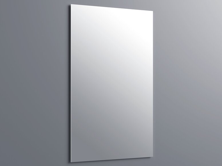 A rectangular, frameless mirror on a smooth grey wall