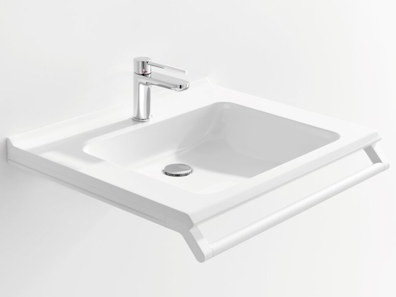 Weißer Waschtisch mit einer rechteckigen Beckenmulde, einem verchromtem Wasserhahn und einem Haltegriff an der Vorderkante