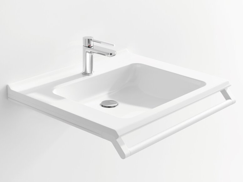 White washbasin with a rectangular bowl, a chrome-plated tap and a support rail along the front edge
